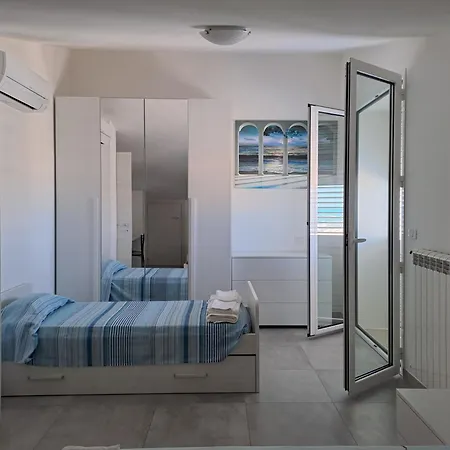 Апартаменты Attico Fronte Mare